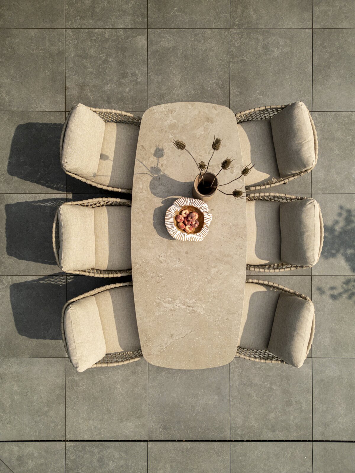 Sardinia low dining set with Nevada table barrel shape ceramic top topview 02.jpg