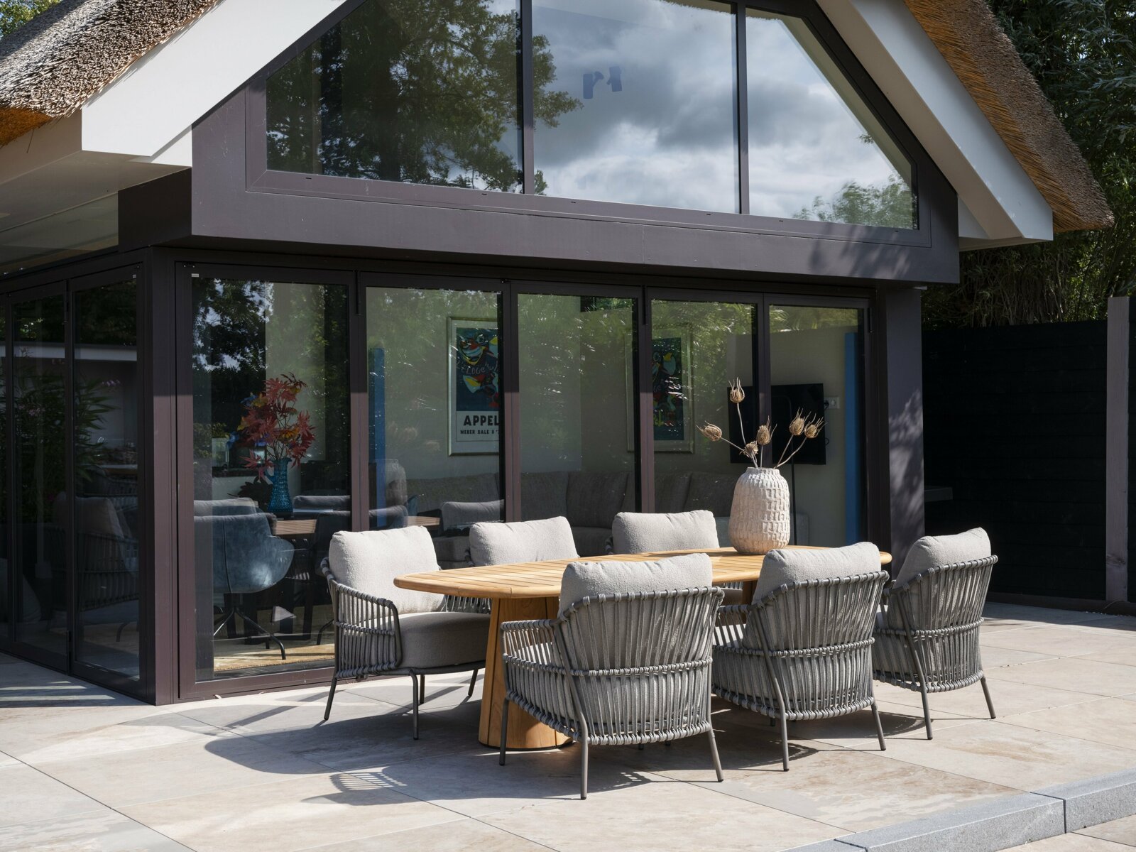 Capalbio low dining set with Capri barrel low dining table 240x100cm Teak outdoor 01.jpg